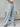 A blue and white striped pants for women, side view