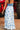Blue floral skirt with a high slit, back view