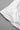 Close-up of a white skirt