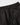 Elastic waistband close-up of black joggers with drawstring