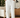 Man wearing relaxed white drawstring lounge pants in a modern living room setting