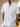 Model wearing white cotton short-sleeve shirt with button collar, hands in pockets