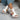 White platform sandals with brown soles, front view