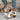 White sandals with brown soles, side view