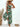 Woman wearing a green leaf-patterned jumpsuit with a white background