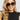 Women smiling wearing sunglasses