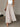 A beige wide-leg pants