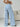 A blue and white striped pants for women, back view