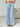 A blue and white striped pants for women, front view