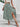 A green floral skirt