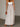 A long beige skirt, back view