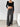 A women black sweatpants full front view