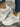 Beige sneakers for women, side view