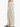 Beige wide-leg linen pants worn by a person on a white background