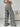 Black and white striped pants, back view