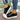 Black canvas with white soles