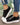 Black canvas with white soles