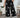 Black pants with white patterns