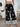 Black pants with white patterns