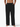 Black pants worn by a person on a white background