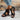 Black sandals with brown soles
