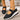Black shoes with white soles for women