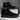 Black suede Chelsea boots on a gray and white background