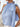 Blue and white striped halter top worn by a person on a white background