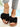 Brown sandals with black bows, front view