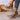 Brown wedge sandals with white sole