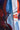 Close-up of a colorful shirt with abstract patterns and a button