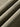 Close-up of three different shades of brown fabric