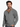 Man wearing a grey textured pullover with a unique brown asymmetrical button-up collar, styled casually with denim jeans 