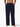 Navy blue pajama pants worn by a person on a white background