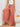 Person wearing pink wide-leg pants 