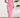Pink strapless ruffled dress worn by a person against a white wall with a plant in the background