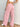 Pink striped pants for women, back view