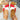 Red and white sandals with brown soles 