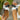 White and black sandals with brown soles