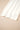 White fabric on a beige background