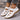 White sandals with brown soles for women