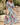 Woman in a colorful floral dress