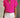 Woman wearing a bright pink blouse with ruffled sleeves and white shorts against a neutral background