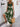 Woman wearing a green boho dress